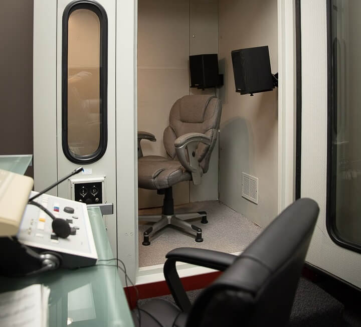 Soundproof hearing assessment booth at Arnold Hearing Centres'